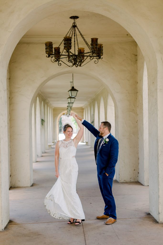 Bride and Groom dancing on their wedding day in Balboa Park 