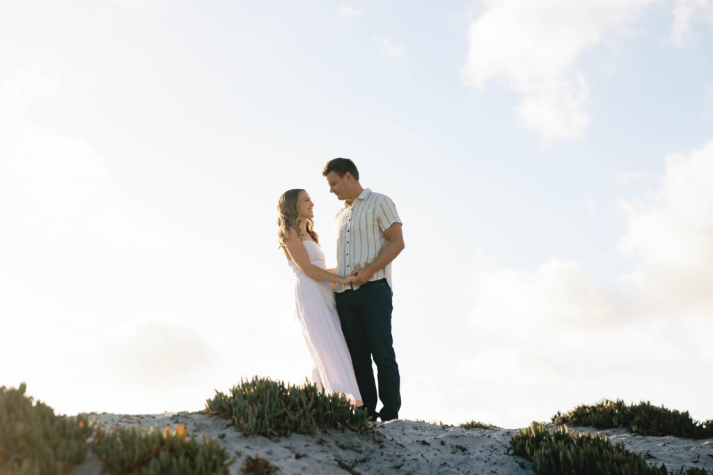 Engaged couple exploring the Coronado Sand Dunes