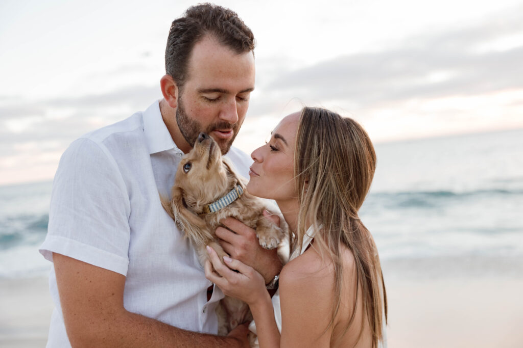 Couple and their dog at Windansea Beach engagement session.