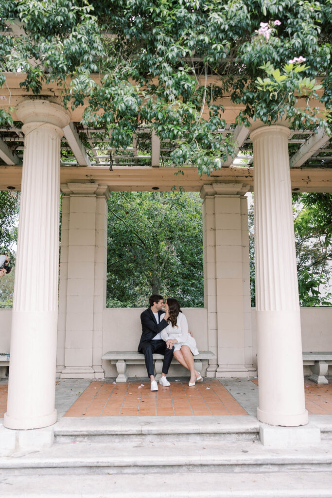 Engaged couple at Alcazar Garden in Balboa Park in San Diego