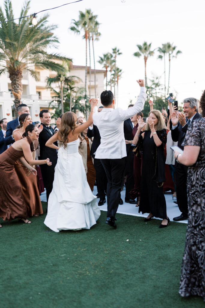 Bride and groom dancing at wedding reception at Park Hyatt Aviara