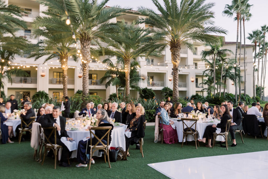 Guests sit at their tables at Park Hyatt Aviara wedding reception