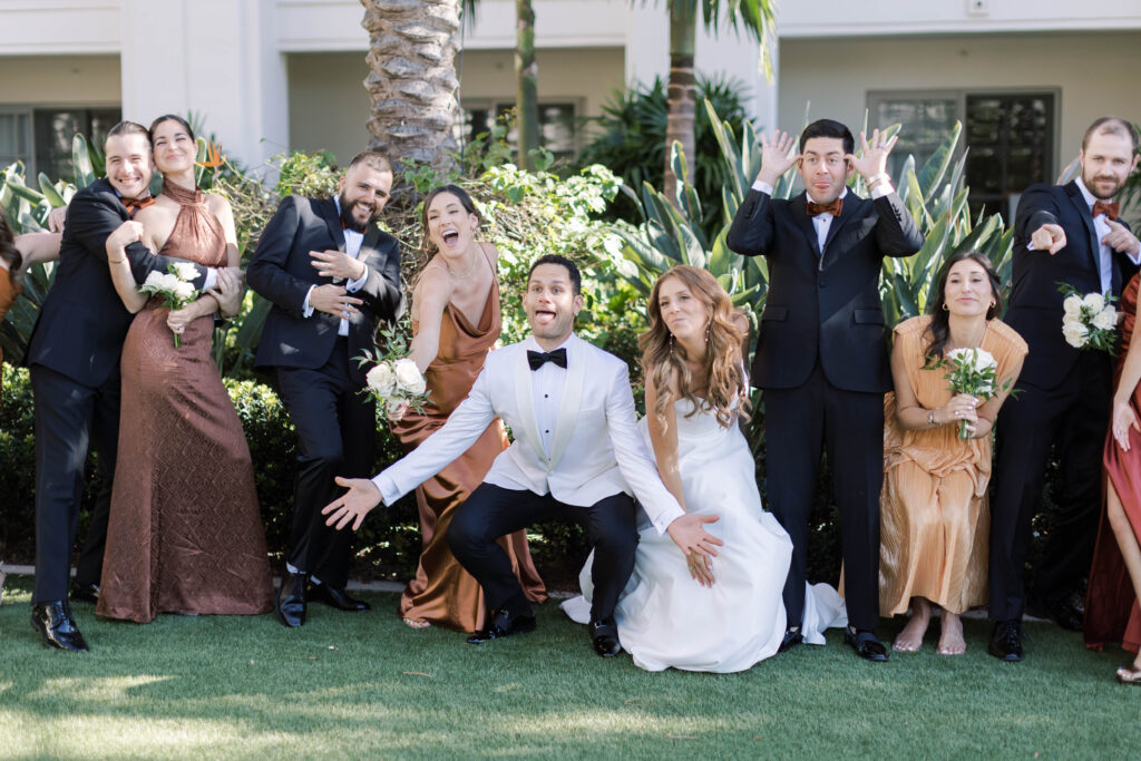 Bridal party makes funny faces at Park Hyatt Aviara