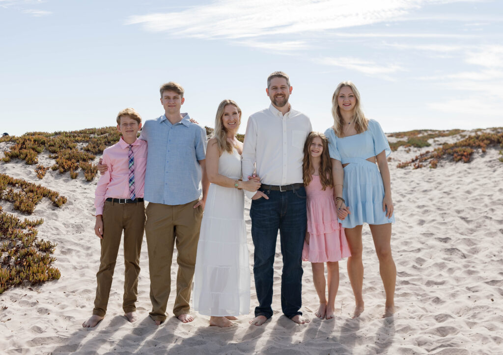 Family posing at Coronado Sand Dunes