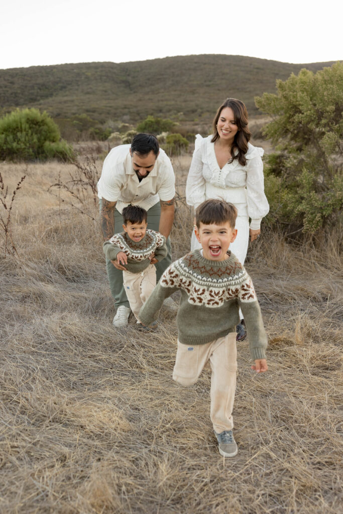 Kids running away from parents in San Elijo